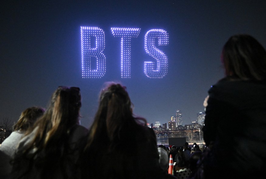 Drones form the BTS logo over a Seoul riverside park