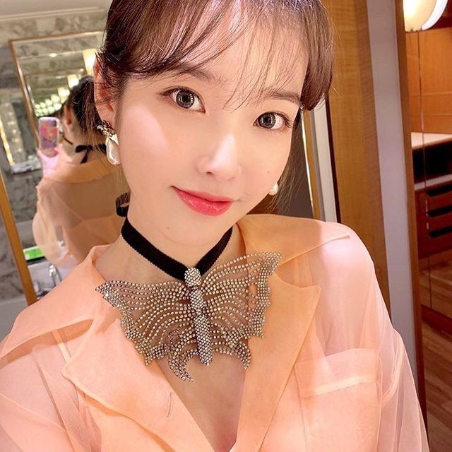 IU transformed into a goddess of spring ... Lovely beauty