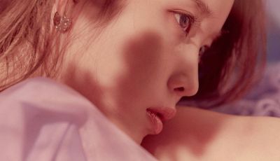 #LILACHasBLOOMED: IU Goes Clubbing on a Train in 'LILAC' MV