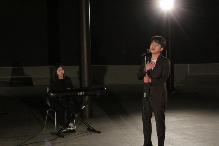 Kim Young Geun (R) During His Performance of "Are You Listening"