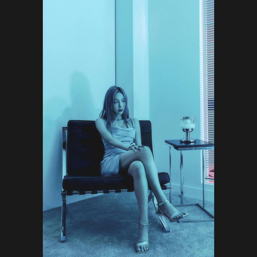 Taeyeon radiates sexy beauty in slips under blue lights