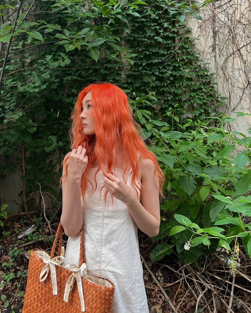 Sunmi, mini dress + western boots… romantic visual