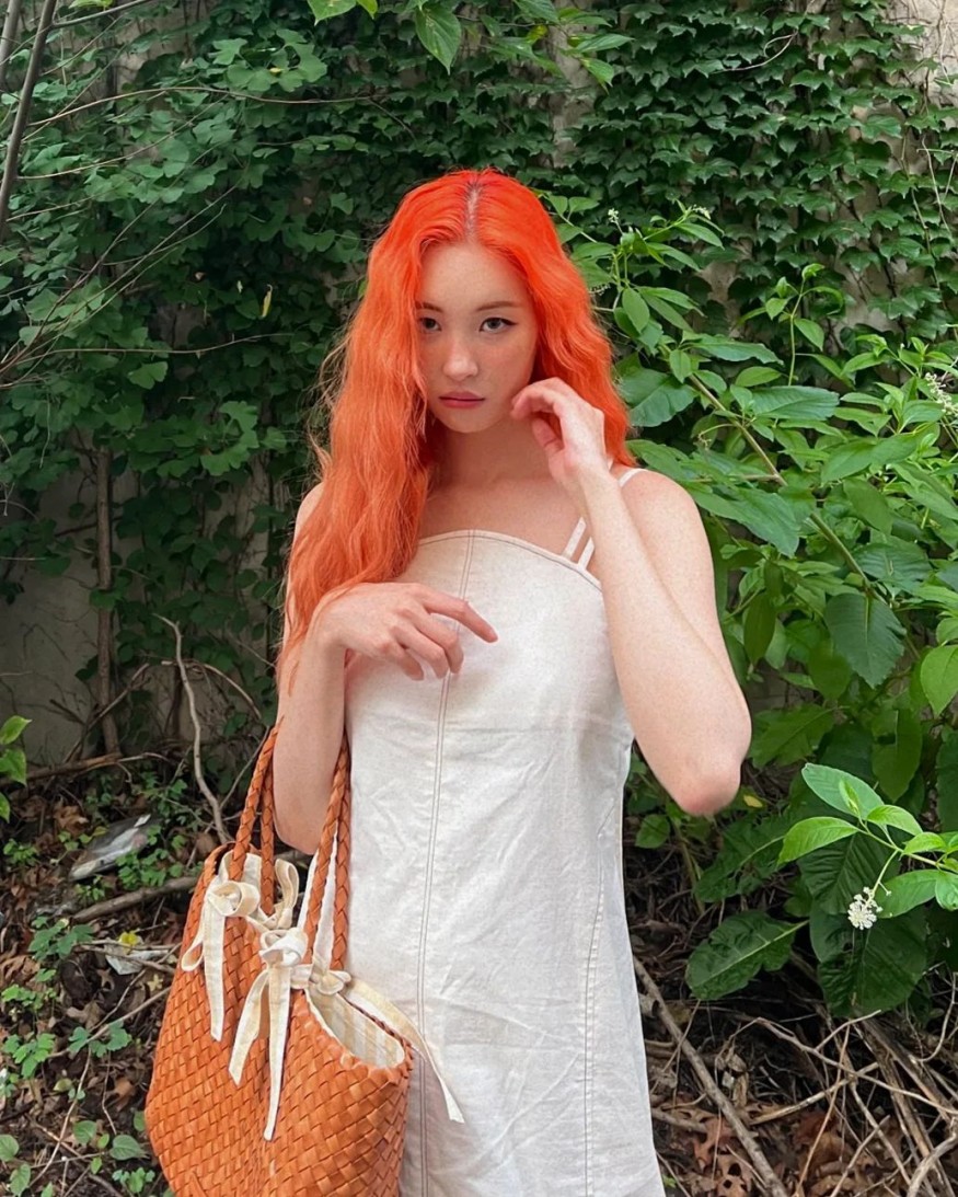Sunmi, mini dress + western boots… romantic visual