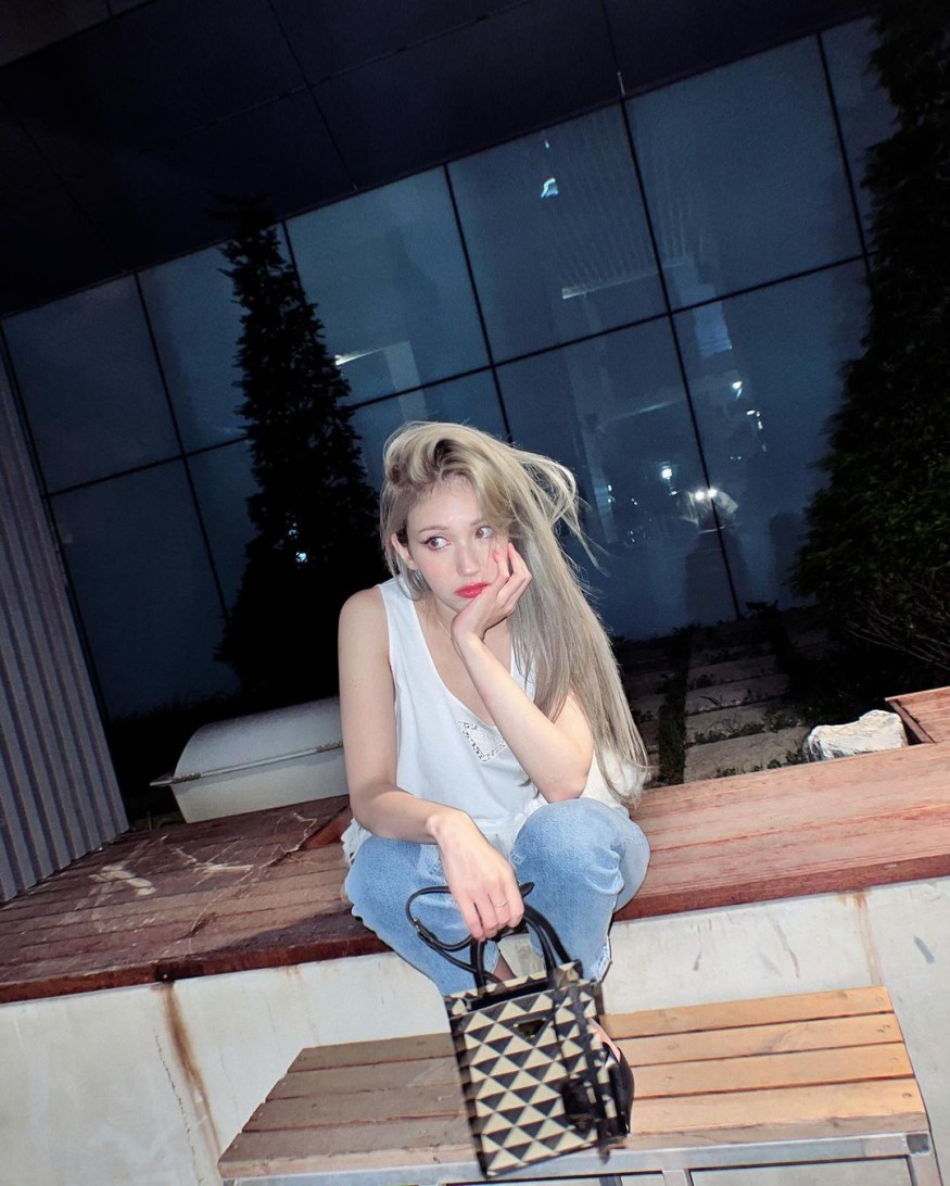 JEON SOMI, blonde and white skin.. Barbie-like visuals