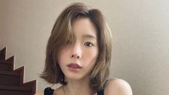 Taeyeon, the glamor that doesn't fit the microfiber forearm... the one who has it all