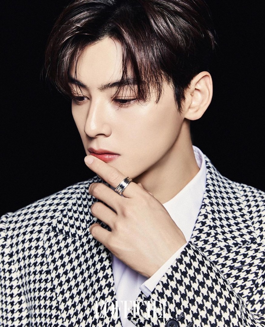 Cha Eun-woo, wearing a shower robe and smiling brightly