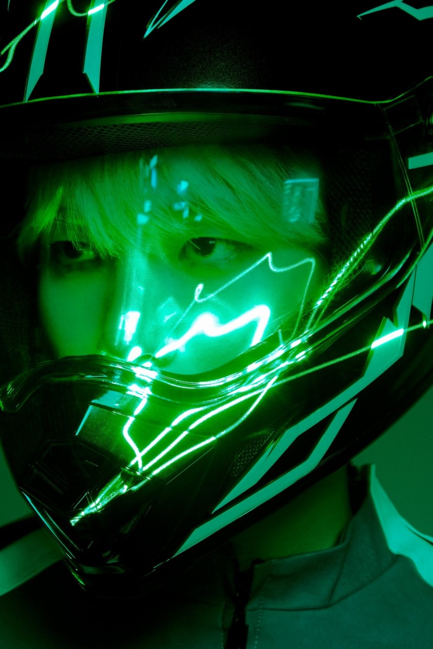 Key, this time darkly... 'Charisma' riding a bike