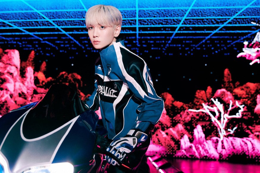 Key, this time darkly... 'Charisma' riding a bike