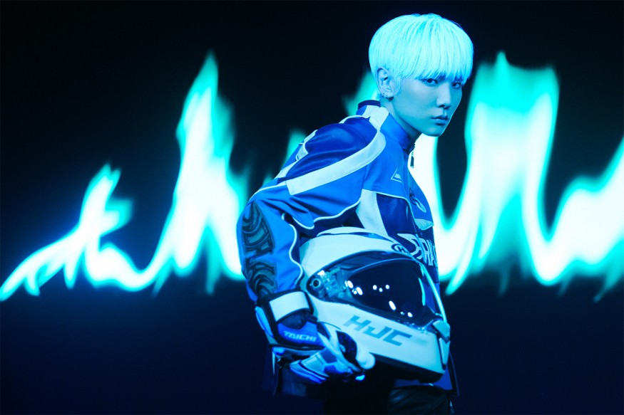 Key, this time darkly... 'Charisma' riding a bike